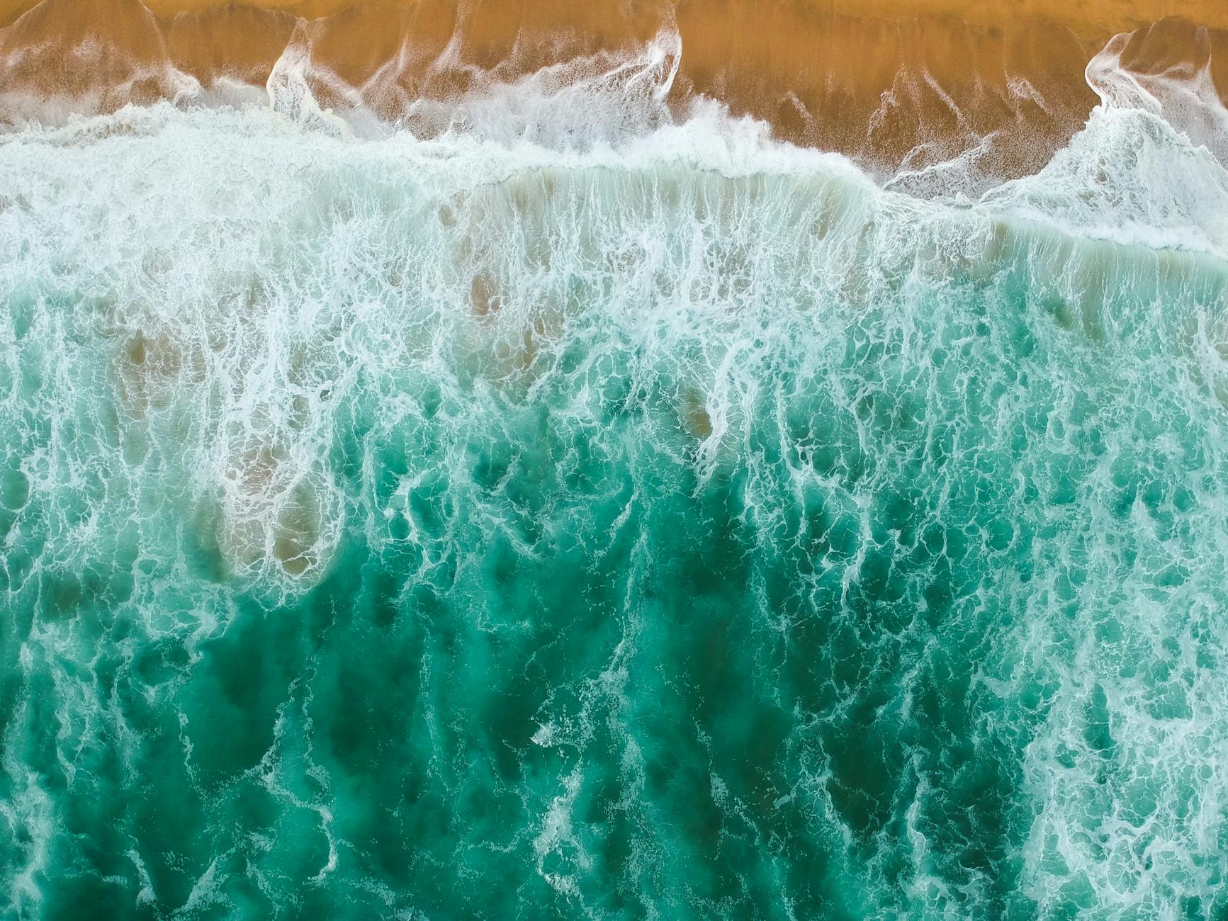 aerial photography of body of water